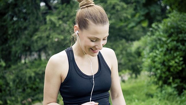 Enjoying music while exercising. Music exercise generic. Thinkstock