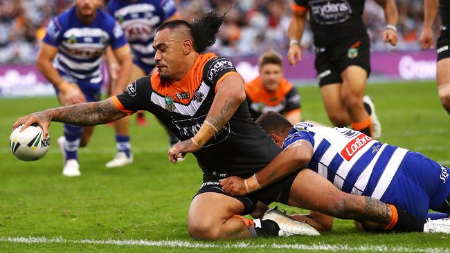 SYDNEY, NEW SOUTH WALES — MAY 27: Mahe Fonua of the Tigers scores a try only to have it disallowed during the round 12 NRL match between the Wests Tigers and the Canterbury Bulldogs at ANZ Stadium on May 27, 2018 in Sydney, Australia. (Photo by Mark Kolbe/Getty Images)