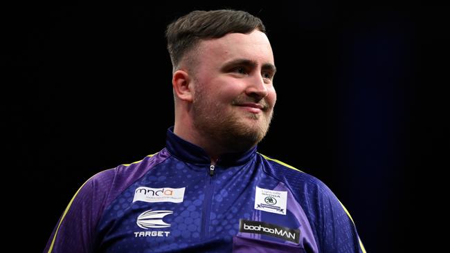 LONDON, ENGLAND - MAY 23: Luke Littler of England reacts after getting a 9 dart finish in the Final against Luke Humphries of England at the 2024 BetMGM Premier League Darts Play-Offs at The O2 Arena on May 23, 2024 in London, England. (Photo by Justin Setterfield/Getty Images)