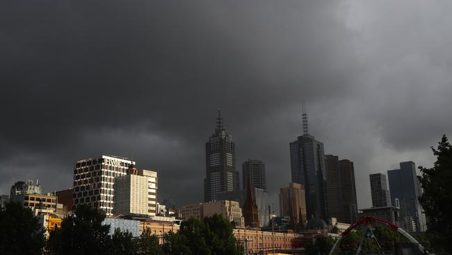 Dark clouds loom over Melbourne. Picture: David Crosling