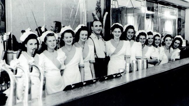 Alex Zakos – father of Freshwater businessman Chris – who started the family's property empire. He is pictured centre at The Astoria Cafe in the Corso, Manly. He owned a number of businesses in Manly and Freshwater during his life. Picture: Supplied.