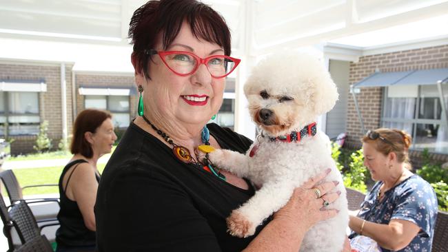 Dianne Shiels, with her dog Ariane, enjoy time with friends at Jasmine Grove. Picture: Britta Campion