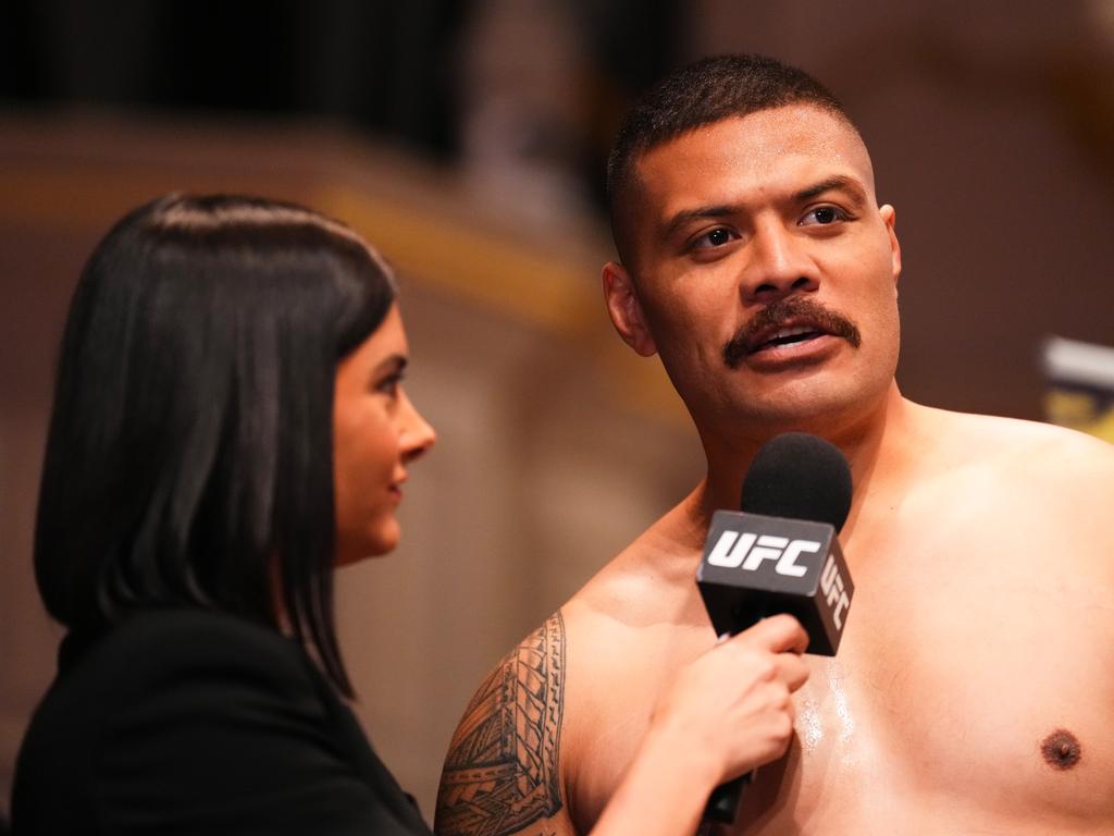 Tafa talks to UFC host Megan Olivi at Wednesday’s open workouts. Picture: Chris Unger/Zuffa LLC/Getty Images