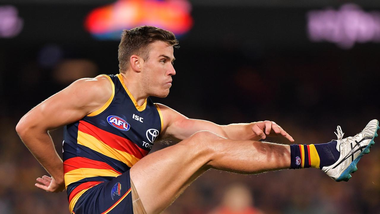 ADELAIDE, AUSTRALIA - APRIL 28:  Paul Seedsman of the Crows kicks the ball during the round six AFL match between the Adelaide Crows and Gold Coast Suns at Adelaide Oval on April 28, 2018 in Adelaide, Australia.  (Photo by Daniel Kalisz/Getty Images)