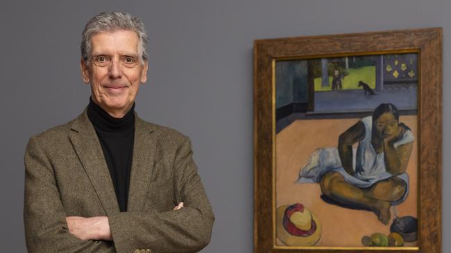 Curator Henri Loyrette with Gauguin’s The Brooding Woman. Picture: Kerrie Brewer / National Gallery of Australia