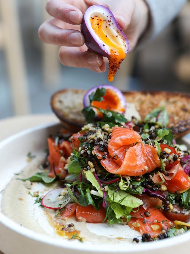 Gin-cured trout with green leaves, smoky baba ganoush and a purple pickled egg.