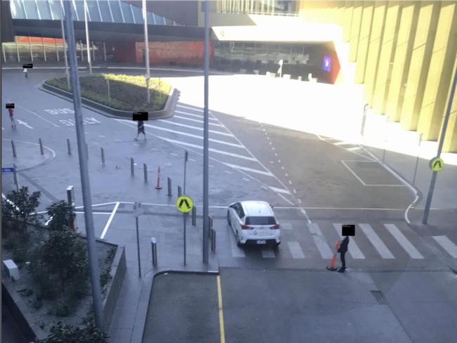 A Melbourne hotel quarantine quest walks out of the Pan Pacific in South Wharf to go to a convenience store before being stopped by a security guard. Picture: Supplied.