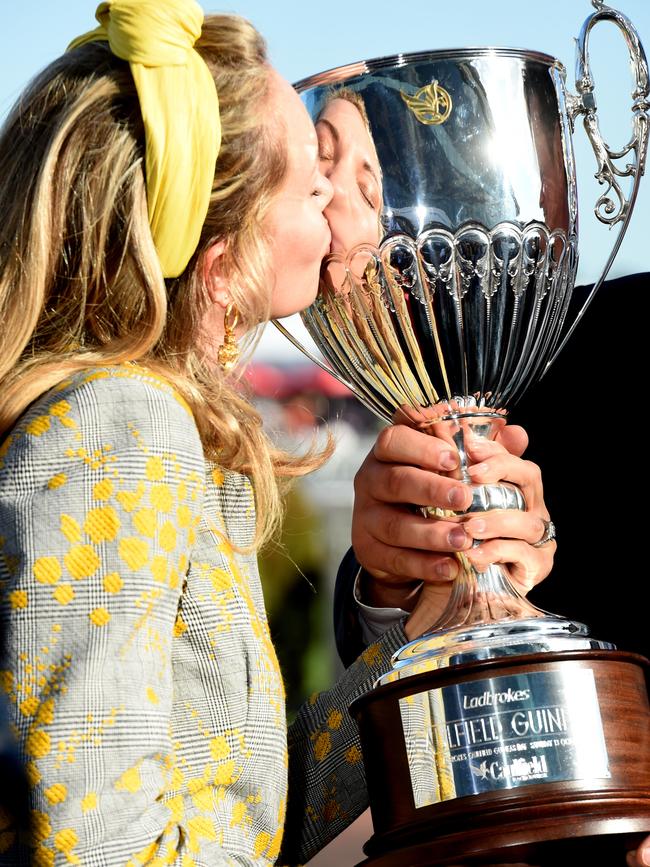 Alice Messara, wife of part-owner Paul, with the winning trophy. Picture: Jay Town