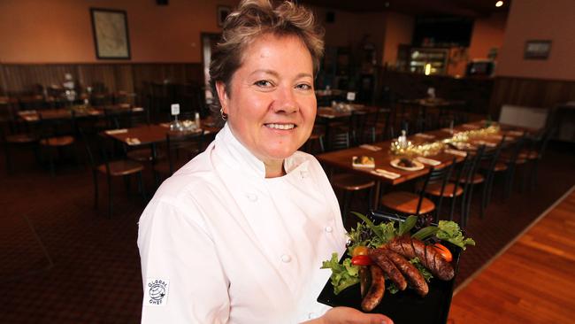 Bracknell Hotel  chef Sharon Cameron with  her venison thick sausage, possum chipolatas, and crocodile fillet. Picture: Bruce Mounster