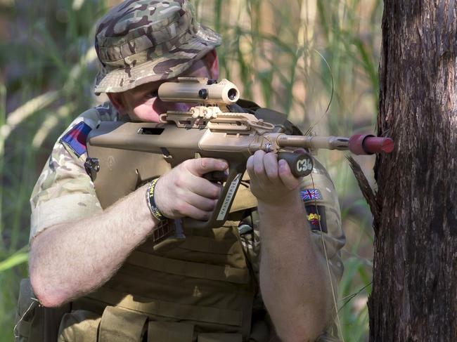 DARWIN, AUSTRALIA - APRIL 15: In this handout photo provided by the Australian Defence Force, Prince Harry patrols during Exercise Thunder Observer, a Joint Fire Team exercise with the 8th/12th Regiment, Royal Australian Artillery, at Robertson Barracks on April 15, 2015 in Darwin, Australia. Prince Harry has spent his first two weeks secondment in the Australian Army with the North-West Mobile Force (NORFORCE) and the 1st Brigade. (Photo by CPL Oliver Carter/Australian Defence Force via Getty Images)