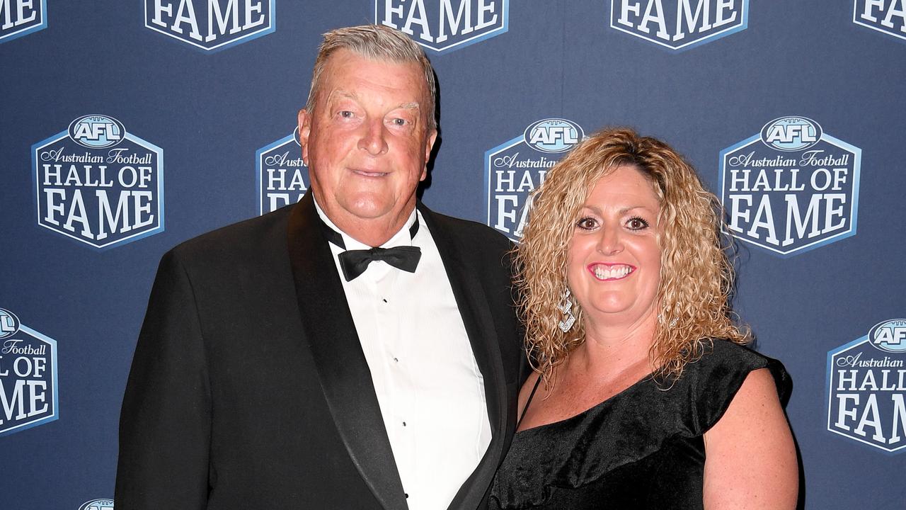 1981 Brownlow medal winner Barry Round and Jenni Lumb on the red carpet at the 2018 Australian Football Hall of Fame Induction Dinner at Crown Palladium in Melbourne, Tuesday, May 29, 2018. Six AFL greats will be inducted into the Australian Football Hall of Fame and an existing member to be elevated to legend status. (AAP Image/Joe Castro) NO ARCHIVING