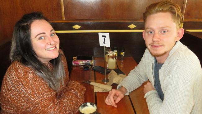 Chloe Rooney and Caleb Ahern of Ravenshoe catch up in the newly restored booths at the historically significant Popular Cafe Ravenshoe which has recently reopened to the public with a new menu. PHOTO: David Anthony