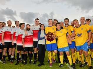 IN HIS HONOUR: The Caloundra and Kawana Football Clubs unite for the inaugural Lachlan Wells Charity Shield match. Lachlan's aunt Kristine Hanna (centre) spoke on the family's behalf. Picture: John McCutcheon