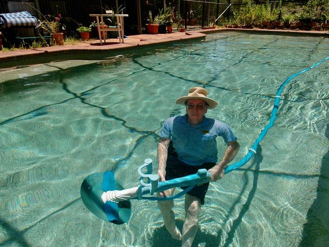 If you have a swimming pool be like Bill Brazier (above) who uses a solar-powered pump to keep his pool clean and efficient. Picture: Paul Riley.