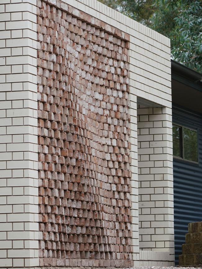 This undulating brick wall at Royal Hobart Hospital is one of a series of complicated bricklaying designs built quickly and accurately using Fologram’s software. Picture: supplied