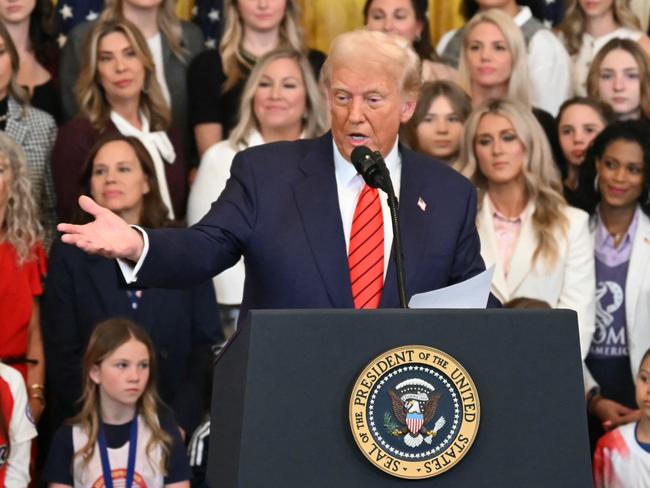 US President Donald Trump speaks before signing the No Men in Women's Sports Executive Order into law in the East Room of the White House in Washington, DC, on February 5, 2025. (Photo by ANDREW CABALLERO-REYNOLDS / AFP)