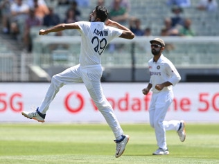 Ravi Ashwin jumps for joy after dismissing Steve Smith for a duck.