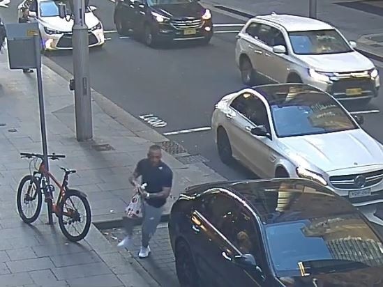 A CCTV still showing Yusuf Nazlioglu attempting to steal a black Mercedes on Castlereagh street in Sydney.
