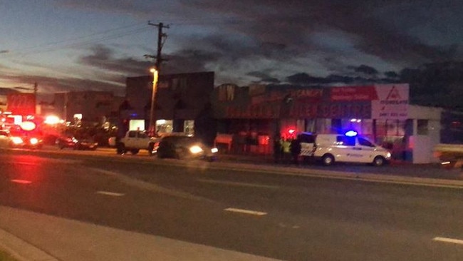 Police at Brisbane Road in Biggera Waters after a squad car was rammed.