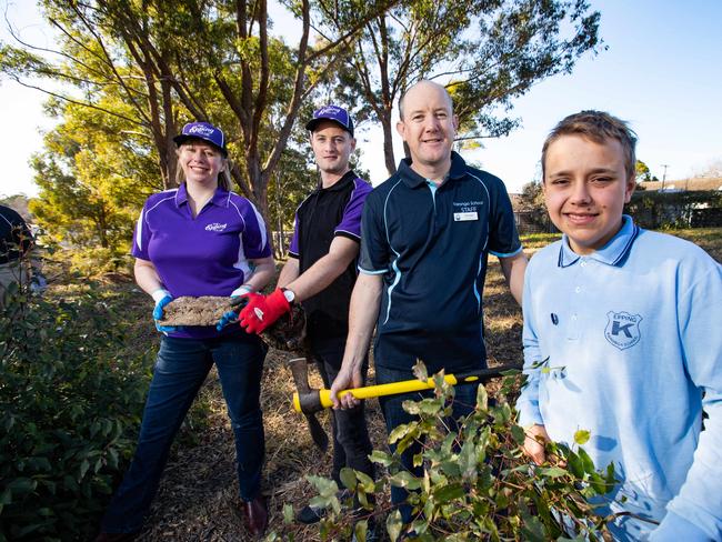 DoSomething Day 2018.Portraits taken on 25th July 2018 at Karonga School, Epping, of staff from The Epping Club clearing a green area at the school for special needs students. Pictured (L-R) is:Seona Wallace, Director of Epping Club.Ryan Clarke, food and beverage manager of Epping Club.Mark Gosbell, Principal of Karonga School.Karonga school Vice-Captain Joshua.(AAP Image / Julian Andrews).