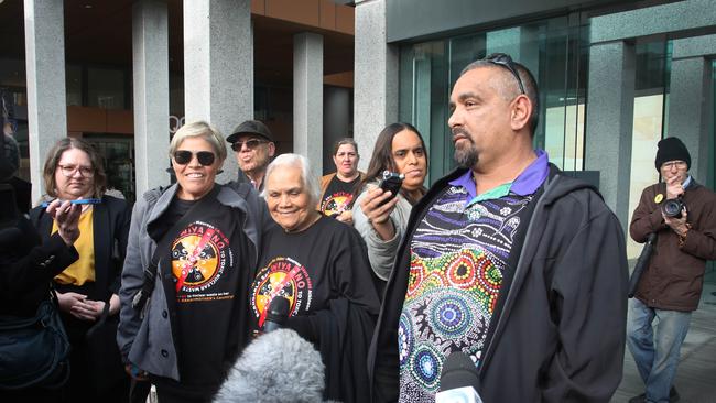 Barngarla members Jason Bilney (right), Maureen Dare and Jonas Dare front the media after the Federal Court decision. Picture: NCA NewsWire/Dean Martin