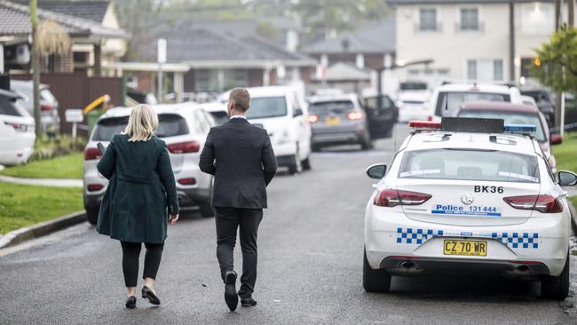 Detectives assess the scene on Narelle Cres the morning after the shooting. Picture: Darren Leigh Roberts