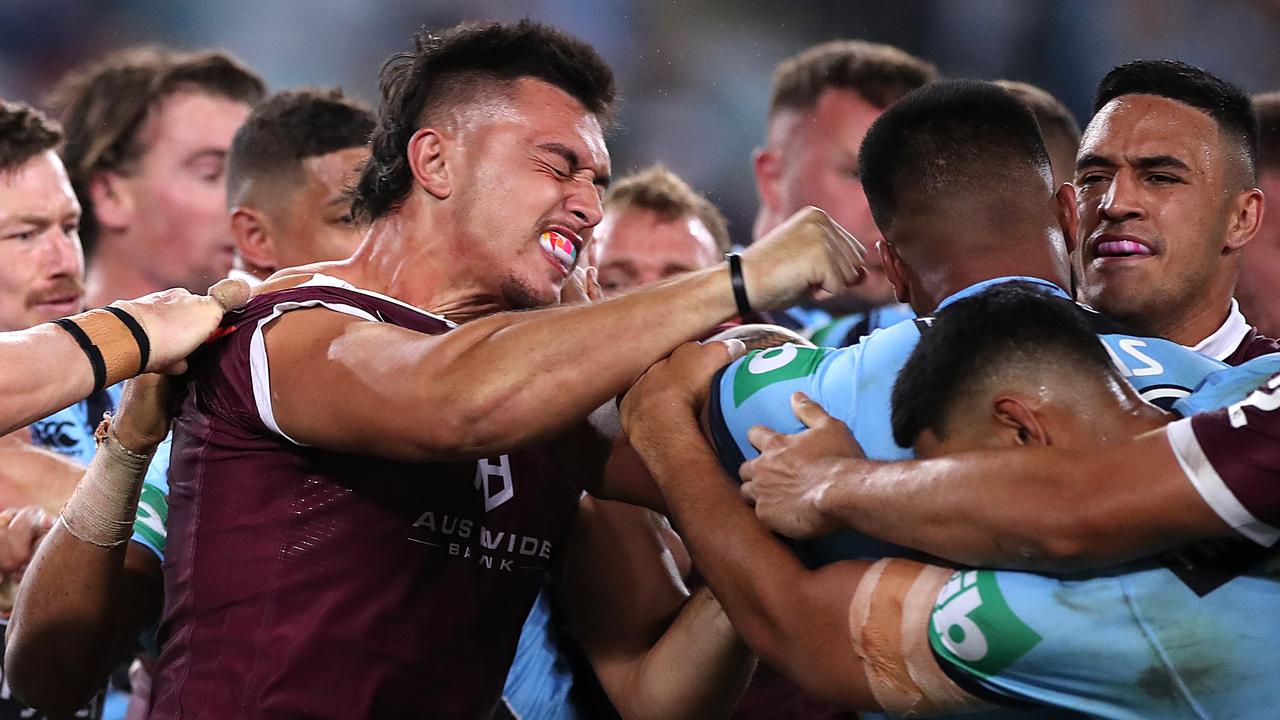 Tino Fa'asuamaleaui and Payne Haas clash during State of Origin. Both were named in the Kangaroos merit team. Picture: Mark Kolbe/Getty Images