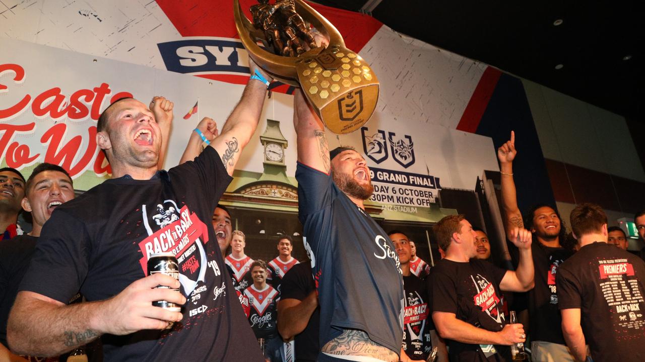 Back to back! The Roosters celebrate with fans at the Easts Leagues club. Pics: Dean Asher.