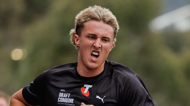 MELBOURNE, AUSTRALIA - OCTOBER 04: Bo Allan (Western Australia - Peel Thunder) crosses the finish line during the 2km time trial during the Telstra AFL National Draft Combine Day 1 at the AIA Centre on October 04, 2024 in Melbourne, Australia. (Photo by Dylan Burns/AFL Photos via Getty Images)