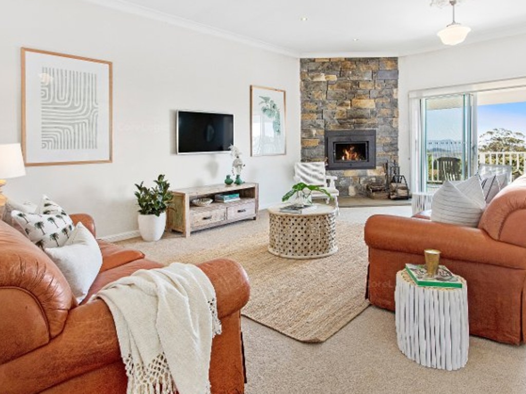 The stone fireplace adds charm.