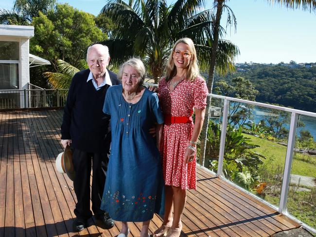 Dr Frank Fisher and wife Penelope with their daughter Sarah Fisher at their former home in Castlecrag.