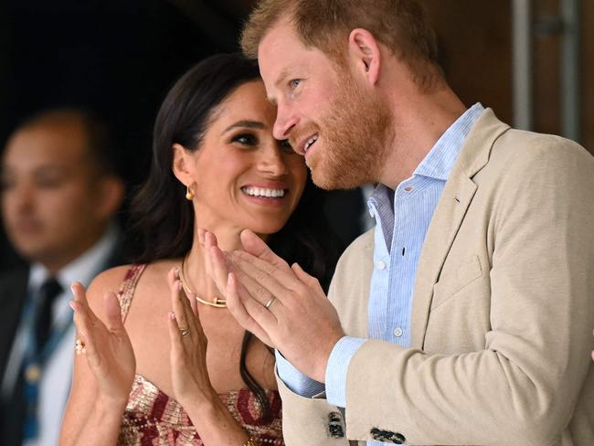 Britain's Prince Harry (2nd R), Duke of Sussex, speaks with his wife Meghan Markle, flanked by Colombia's vice-President Francia Marquez (L) and the director of the National Centre for the Arts Xiomara Suescun attend a performance at the centre in Bogota on August 15, 2024. Prince Harry and his wife, American actress Meghan Markle, arrived in Colombia at the invitation of Marquez, with whom they will attend various meetings with women and young people to reject discrimination and cyberbullying. (Photo by RAUL ARBOLEDA / AFP)