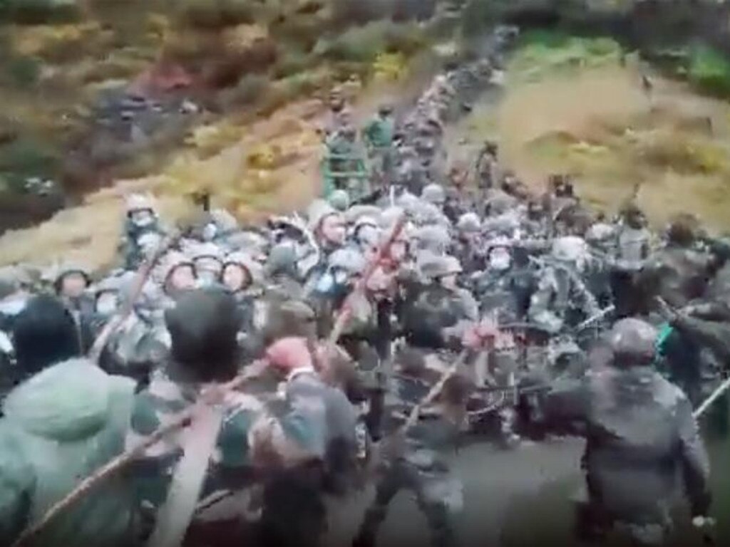 The troops are shown attacking one another with makeshift weapons, before Indian soldiers cross over a barbed wire barrier. Picture: Supplied.