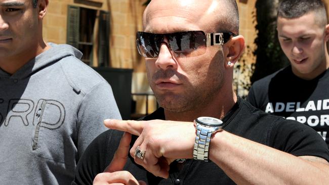 Vince Focarelli with supporters outside the Adelaide Magistrates Court in 2012.