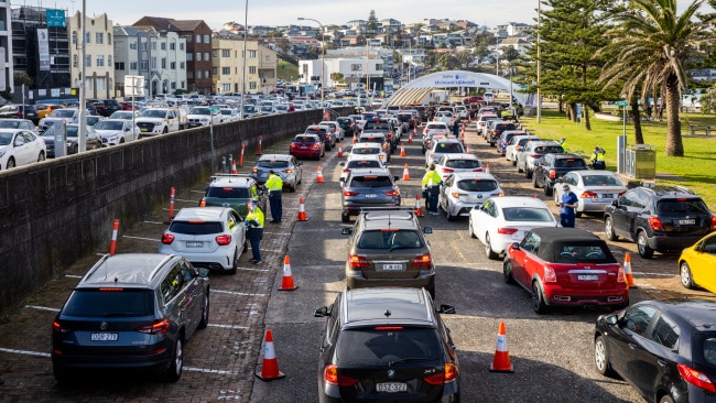 A general view of the Bondi Beach Drive-through COVID-19 Clinic with long lines stretching along Campbell Parade on June 23, 2021 in Sydney, Australia. Picture: Getty