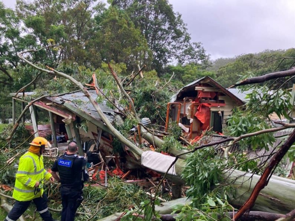 A large gum tree crashed into a Currumbin Valley home on Friday. Picture: Queensland Ambulance Service