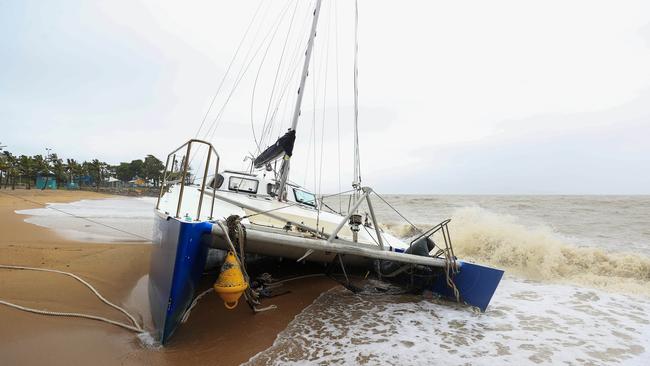 A catamaran washed up on the Strand. Picture: Adam Head