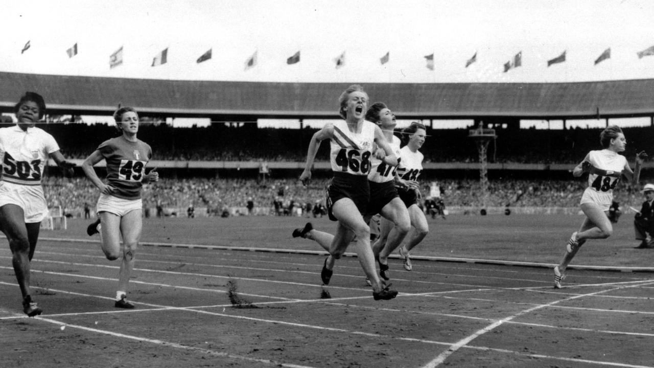 Australian athletics legend Betty Cuthbert wins the 100m sprint in a field that looks jarringly different to what we see in the event today.