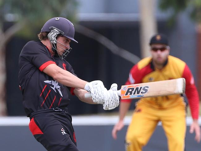 James Seymour launches into a pull shot for Essendon.