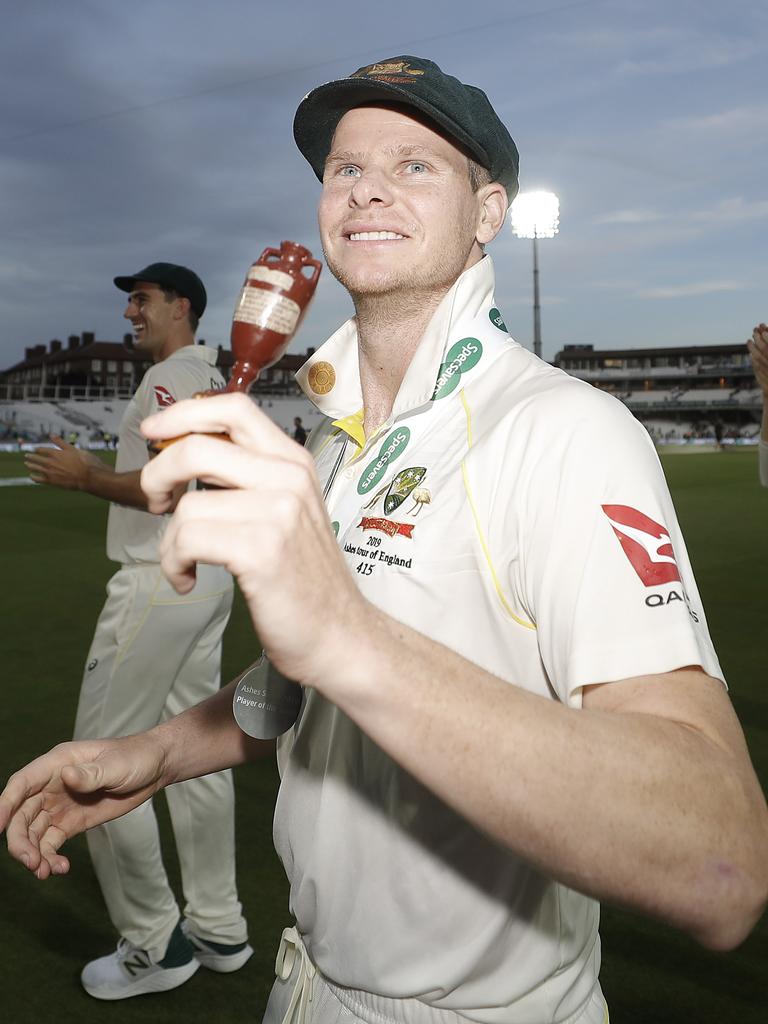 Steve Smith celebrates with the urn after Australian drew the series to retain the Ashes. Picture: Ryan Pierse/Getty Images