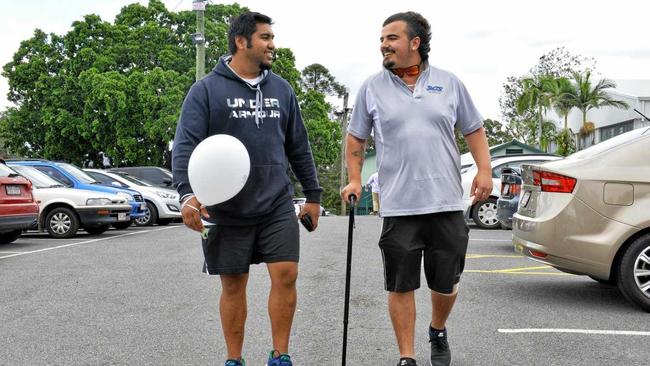 Disabled Ipswich man Andrew Weier, 24 wants to be able to work in a normal job, just like everyone else. Pictured with his carer Suli Kurene from Real Community Services at the annual Fresh Futures event showcasing disability support services. Picture: Helen Spelitis