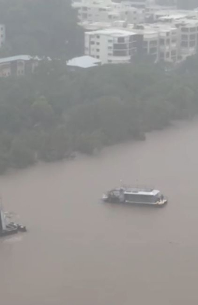 A man has to be rescued from a houseboat after it hit a ferry terminal.