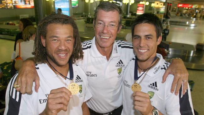 Sport BCM 3.5.07 Andrew Symonds. Andrew Symonds, Mitchell Johnson and coach John Buchanan arrive back in Brisbane. Pic Peter Wallis