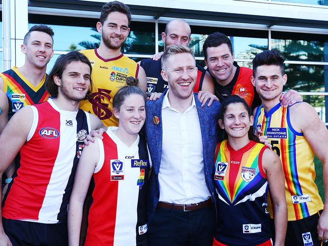 Jason Ball (in suit jacket, centre) is the founder of the Pride match.