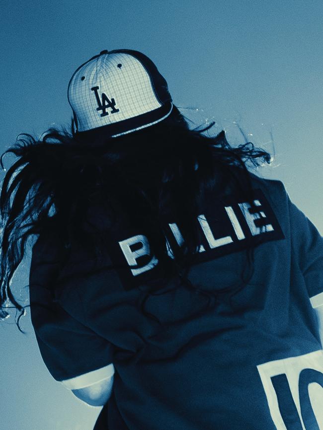 Billie Eilish’s footy-style jersey and LA cap. Picture: Henry Wu