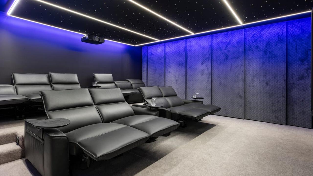 Enjoy a film in the home cinema.