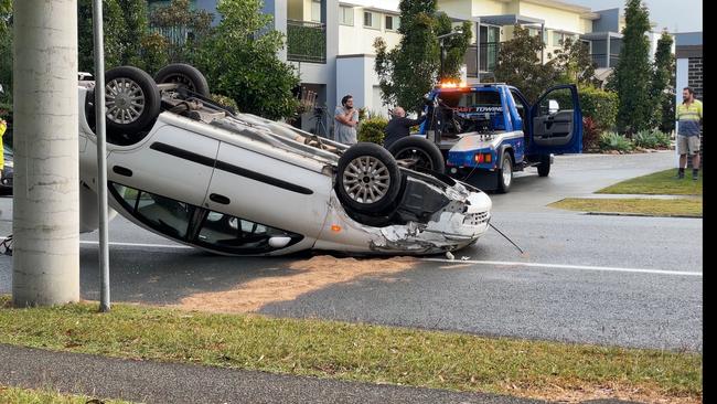 Emergency services called to Central Street in Labrador after car rollover. Photo: Charlton Hart