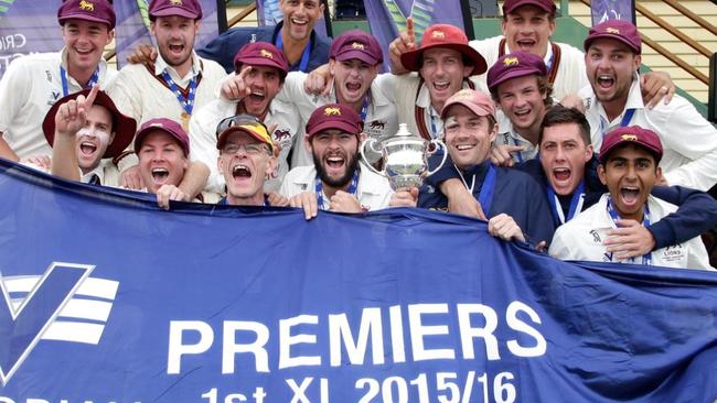 Alavi (bottom, right) celebrates the 2015-16 First XI flag. Picture: Hamish Blair