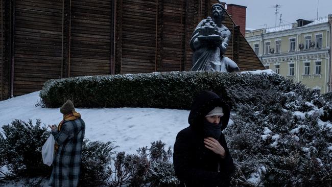 People walk past a statue of Yaroslav The Wise at The Golden Gate in Kiev, Ukraine, amid fears of a Russian invasion. Picture: Getty Images