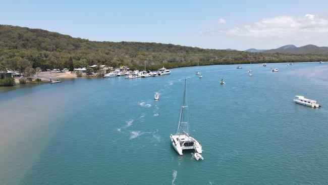 Round Hill Creek at 1770 where paramedics are treating a man who reportedly stepped on a stonefish. Photo: Rodney Stevens DJI Mavic Air 2